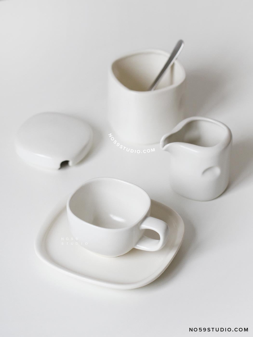 Sori Yanagi Black and White Collection – White Teapot, Creamer, and Sugar Bowl
